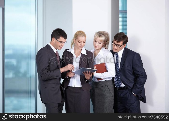 Young business people in suits working