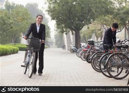Young Business people parking their bikes in Beijing
