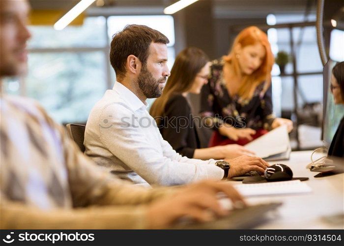 Young business people working in modern office