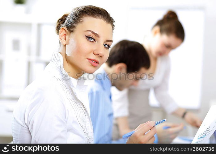 Young business people working together as a team in the office