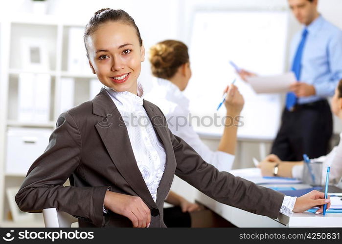 Young business people working together as a team in the office