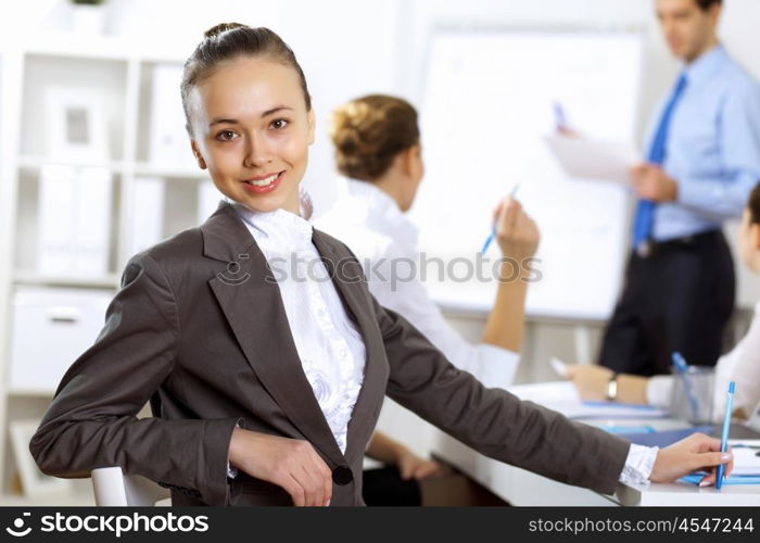 Young business people working together as a team in the office