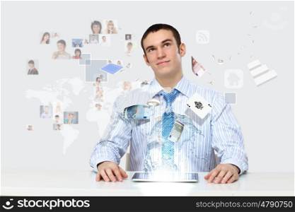 Young business person working with a notebook. Business technologies today