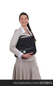 Young business professional carrying a briefcase