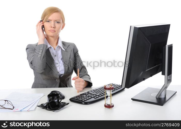 Young business woman at work in the office. Isolated on white background