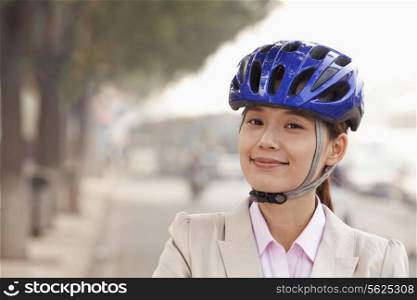 Young Business Woman commuting with a Bicycle, Beijing, China