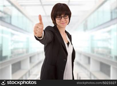 young business woman going thumb up, at the office