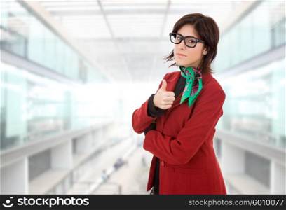 young business woman going thumbs up, at the office