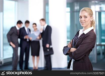 Young business woman in the foreground
