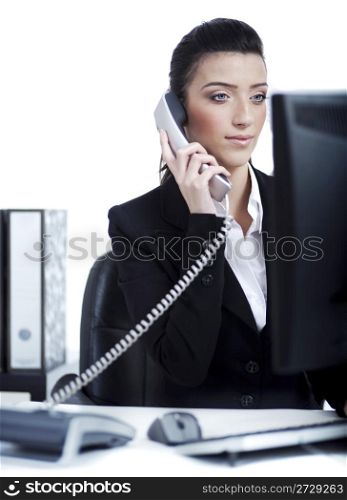 Young business woman making a phone call at office over white background