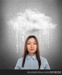 Young business woman or system administrator under cloud with digital rain. Cloud technology concept