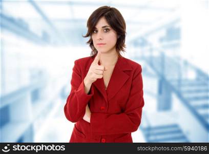 young business woman pointing at the office