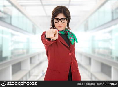 young business woman pointing at the office