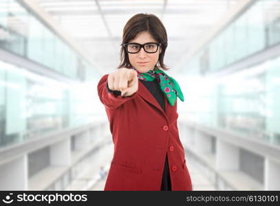 young business woman pointing at the office