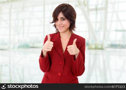 young business woman portrait going thumbs up