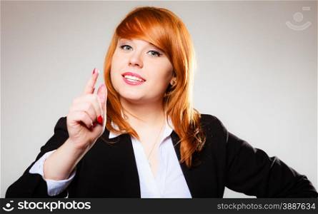 Young business woman smiling and shaking wagging her finger student girl scolding on gray