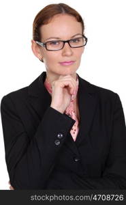 young business woman standing against white background