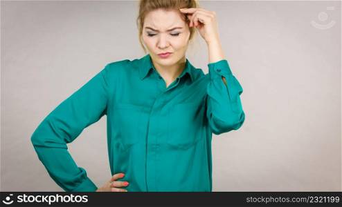 Young business woman wearing jacket intensive thinking finding great problem solution and ideas.. Business woman intensive thinking