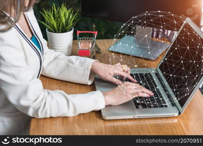 Young business woman work with laptop digital global network on desk at home office