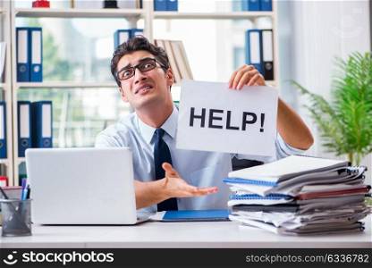 Young businessman asking for help in office. The young businessman asking for help in office