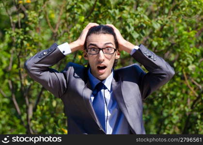 Young businessman at the street scene