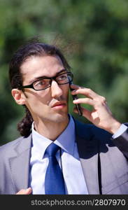 Young businessman at the street scene