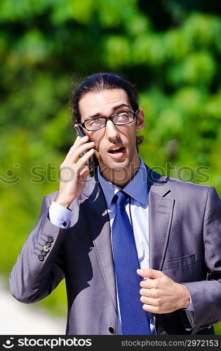 Young businessman at the street scene