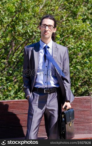 Young businessman at the street scene
