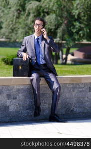 Young businessman at the street scene