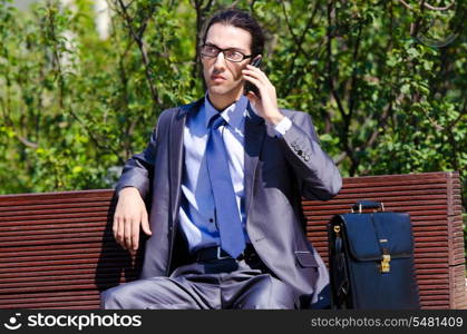 Young businessman at the street scene