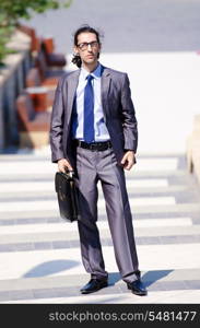 Young businessman at the street scene