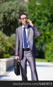 Young businessman at the street scene