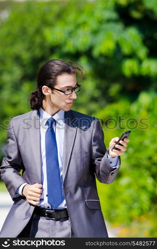 Young businessman at the street scene