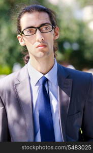 Young businessman at the street scene