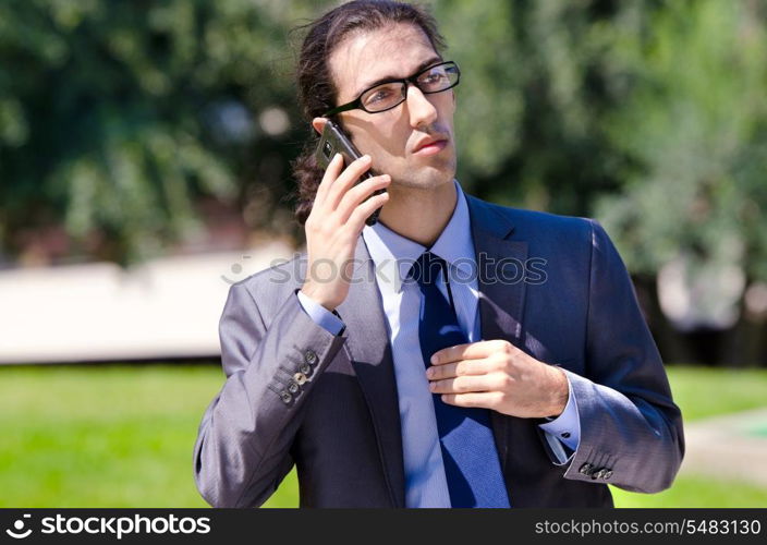 Young businessman at the street scene