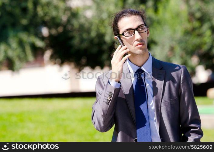 Young businessman at the street scene