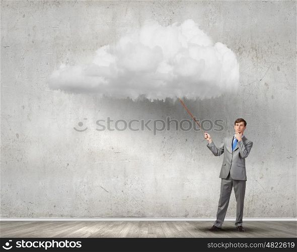 Young businessman caught white cloud with lead. Do not let the idea to leave you