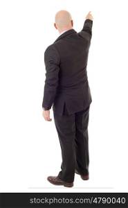 young businessman full body, pointing, in a white background