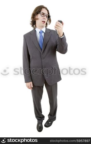 young businessman full length on the phone, isolated on white