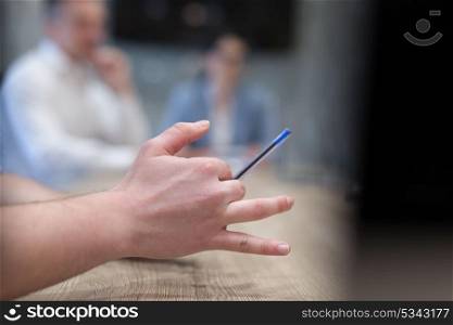 young businessman hand using pen closeup shot