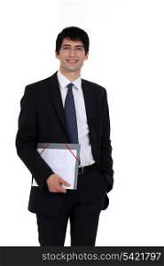 young businessman holding a folder