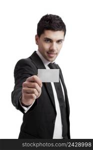 Young businessman holding a personal card on the hand, isolated over a white background 