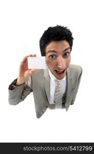 young businessman holding business card playing the fool