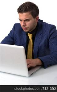 Young Businessman in a Blue suit Working on He&rsquo;s Notebook