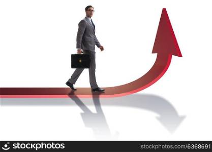 Young businessman in business concept with charts