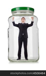 Young businessman in glass jar