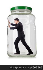 Young businessman in glass jar