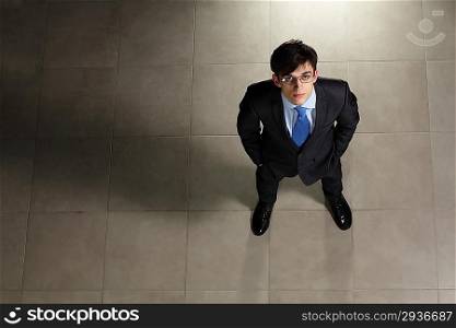 Young businessman in glasses