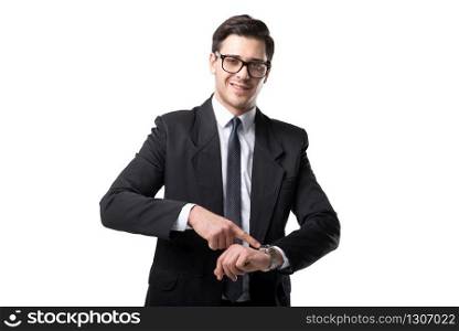 Young businessman in glasses, tie and black suit point a finger on the watch, isolated on white background. Young businessman point a finger on the watch