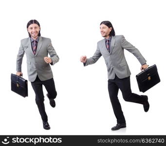 Young businessman in gray suit holding briefcase isolated on whi. Young businessman in gray suit holding briefcase isolated on white